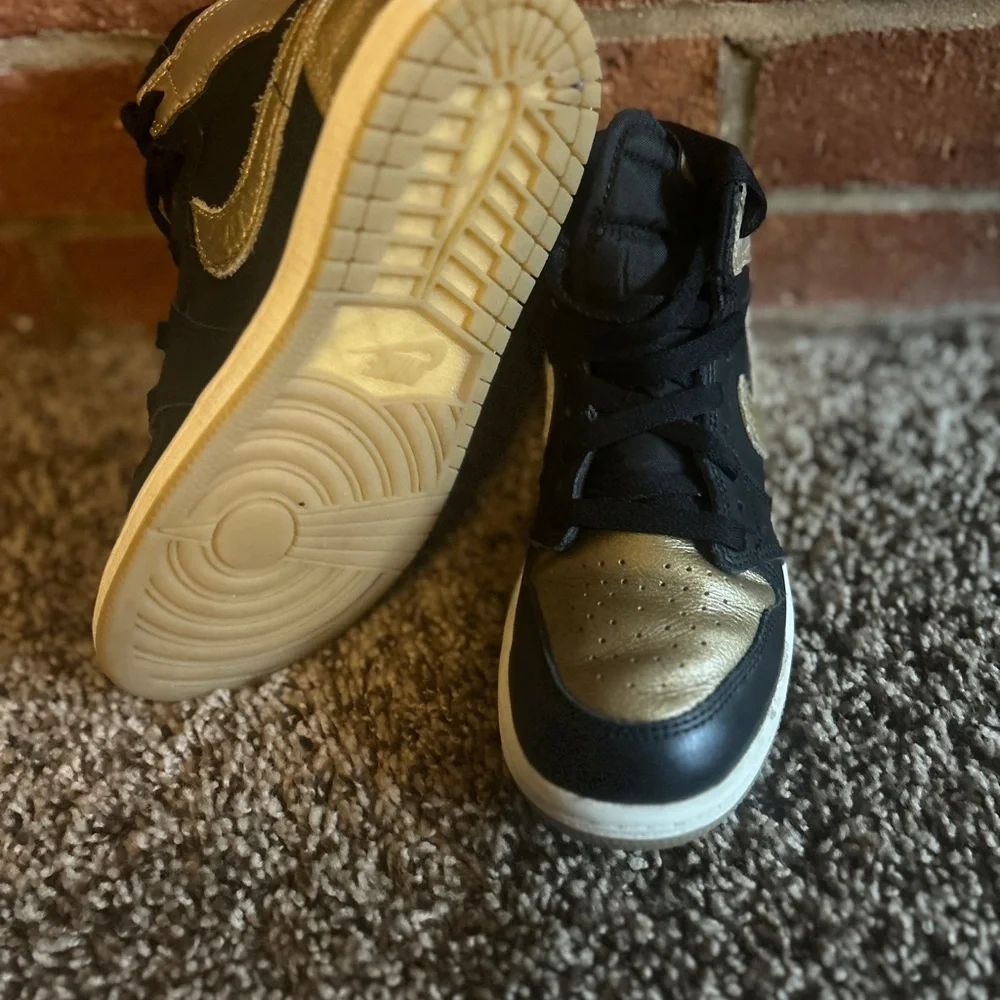 Nike Black and Gold High-Top Sneakers